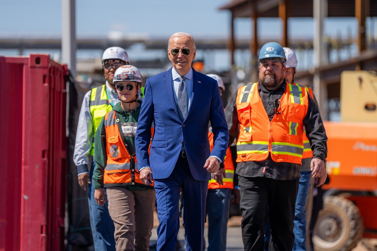 The White HouseFollow P20240320AS-1033 President Joe Biden and union members building Intel's Ocotillo Campus walk onstage before announcing $20 billion in investments to ramp up production of semiconductor chips under the CHIPS & Science Act, Wednesday, March 20, 2024, in Chandler, Arizona. (Official White House Photo by Adam Schultz)